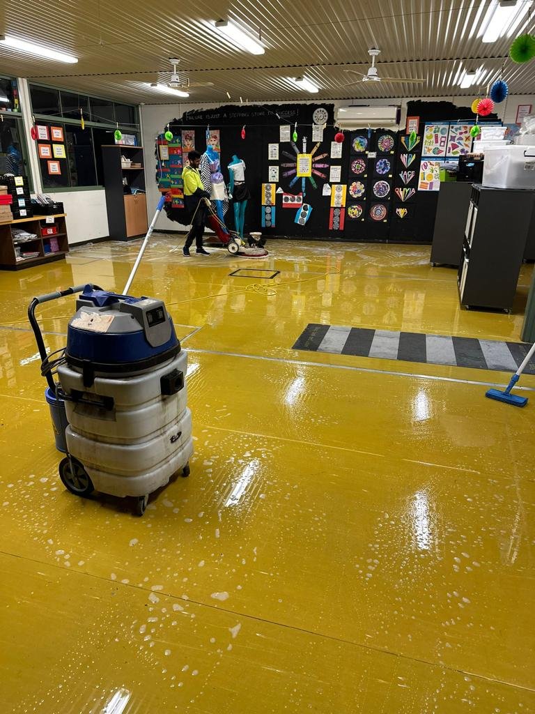 JSS team providing professional cleaning and painting services in a modern Australian home